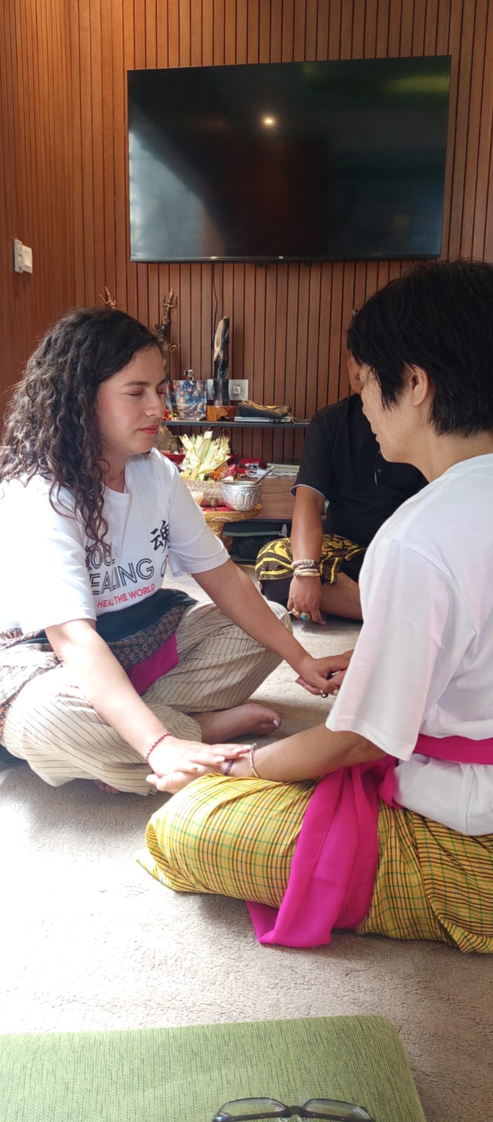 Guest immersed in a peaceful healing ceremony